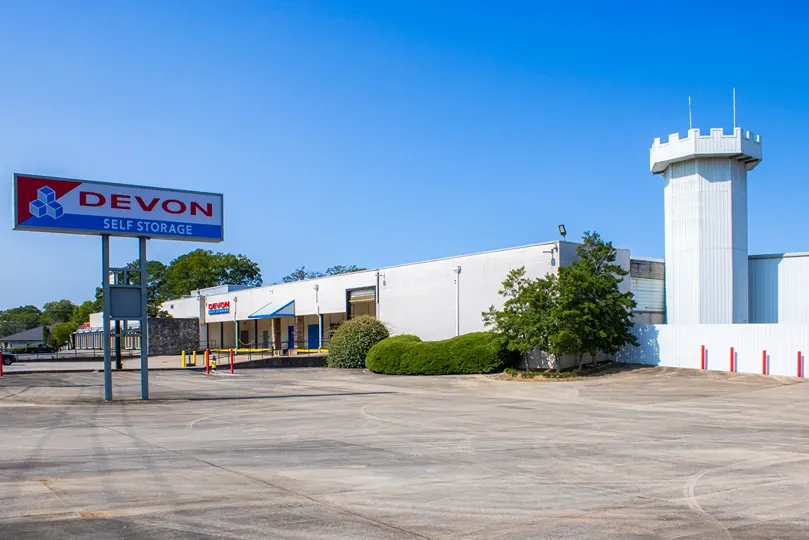 Devon Self Storage facility exterior with signage and wide access parking area