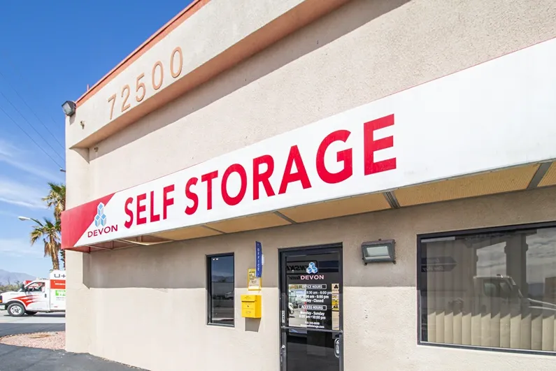 Office entrance with Self Storage sign. 