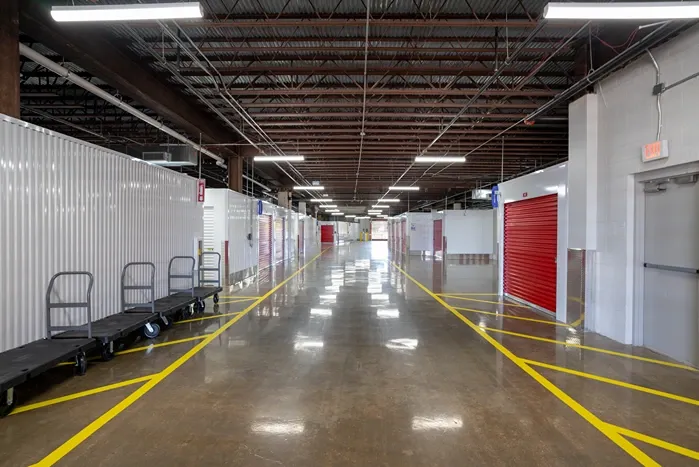 Indoor storage drive aisle with moving carts available for customer use