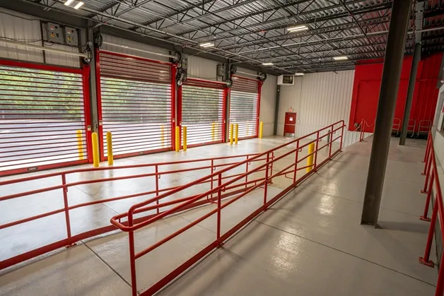 Indoor loading and unloading in Michigan Self Storage facility with drive-up access units