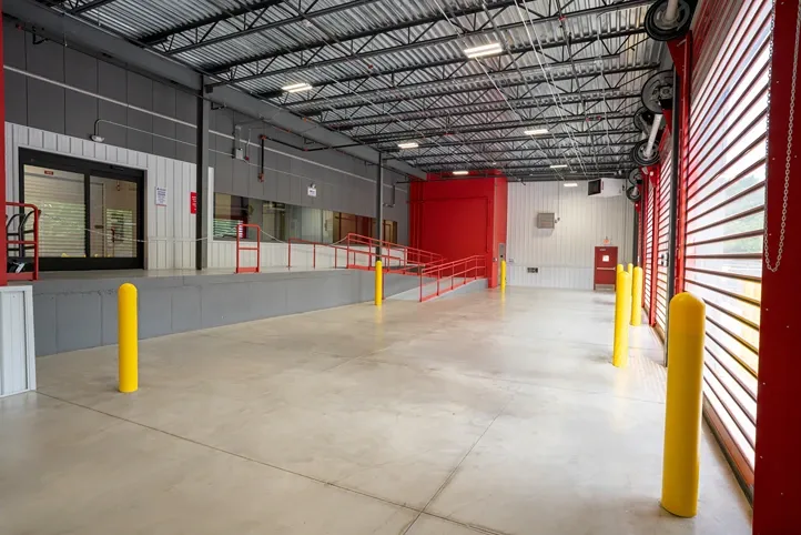 Indoor loading and unloading in Michigan Self Storage facility with drive-up access units