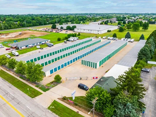 Aerial perspective of large self storage facility with multiple buildings and easy access layout