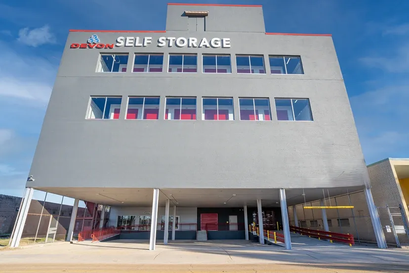 Front view of Devon Self Storage multi-level facility with covered vehicle access area