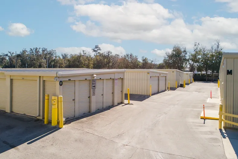 Drive-up storage units with roll-up doors and easy vehicle access
