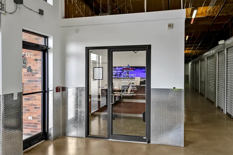 Interior access door between storage units and office area inside facility