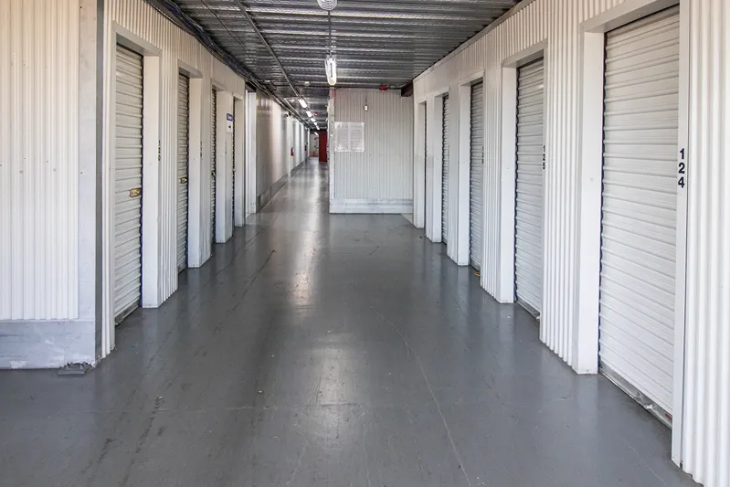 Indoor Storage. The hallway and view of storage units at Devon Self Storage League City, Texas