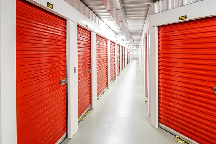Indoor, clean storage units in Pinehurst, TX with red doors