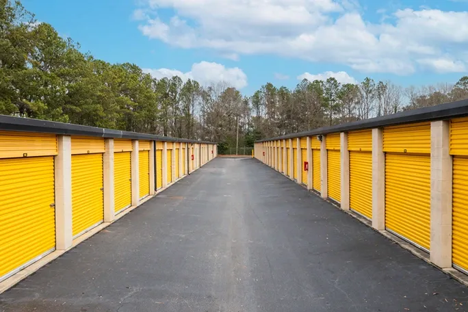Devon Self Storage - Two Notch Road, yellow doors to self storage, drive up access, wide lanes, outdoor storage