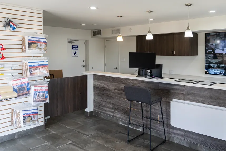 Self storage office with customer service desk and moving supplies for purchase