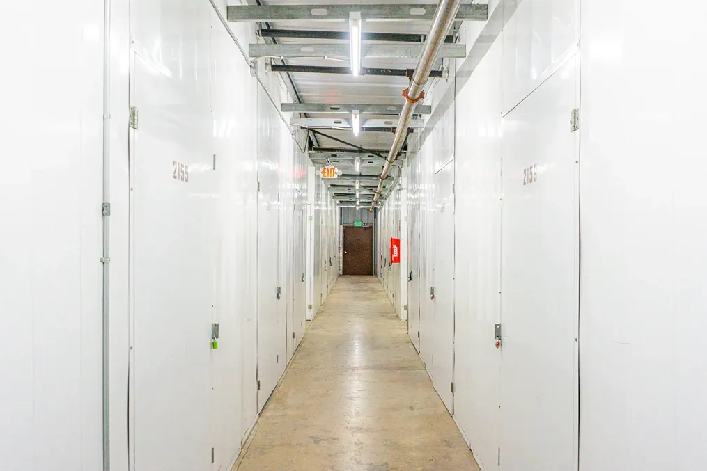 Clean, hallway of self storage units in Orangevale, CA, at Devon Self Storage- Hazel
