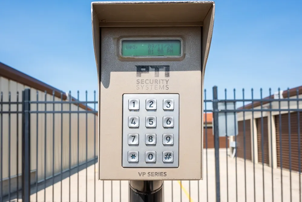 Security keypad access system at storage facility entrance for controlled gate entry