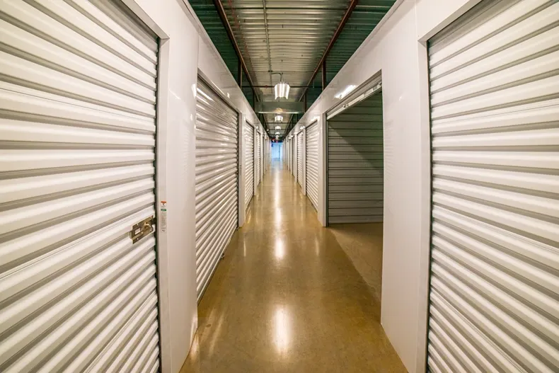 Clean, new storage facility hallway of storage units Devon Self Storage- Yaphank