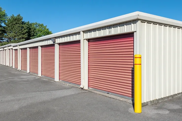 Storage Units in Murfreesboro, TN outdoor storage units with red, faded doors.