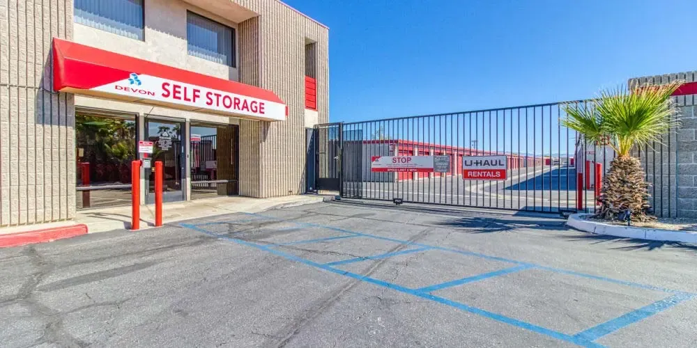 Front office and gated entry into Devon Self Storage in Palm Springs, California