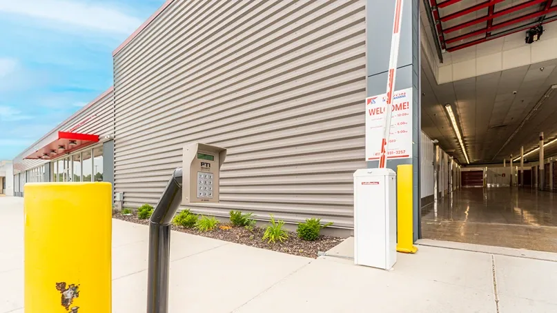Exterior gated entry, keypad to Devon Self Storage drive through access Kenosha, MI