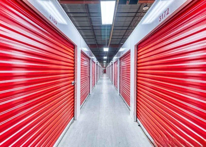 Indoor Storage Units in Grand Rapids, MI. Clean with red doors. Devon Self Storage- Ball Ave.