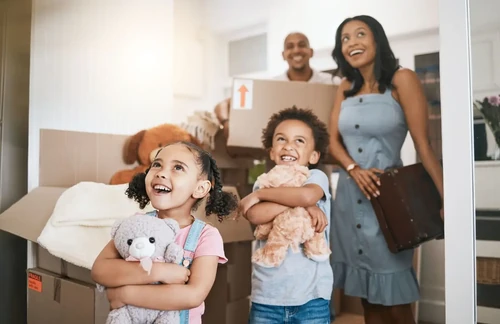 A young family with kids moves into their new home.