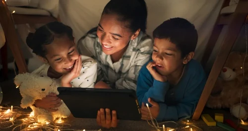 Mom and children watching ipad