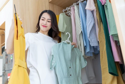 Woman organizing closet
