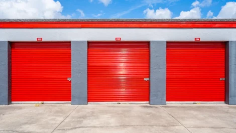 Close up of storage units with red doors Okeechobee Storage Unit at Devon Self Storage