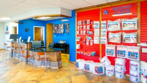 Wall of packing and moving supplies at Devon Self Storage - Athens GA