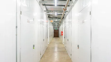 Clean, hallway of self storage units in Orangevale, CA, at Devon Self Storage- Hazel