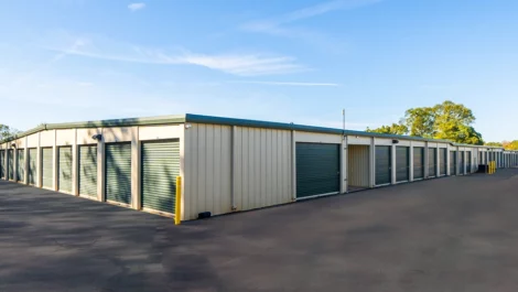 Drive up access, storage units with green doors at Devon Self Storage - Athens GA