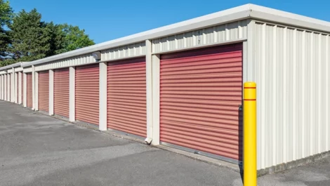 Storage Units in Murfreesboro, TN outdoor storage units with red, faded doors.
