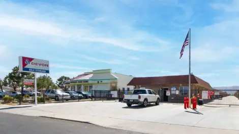 Exterior view of entrance to storage facility in Apple Valley, CA, at Devon Self Storage - Highway 18 #1