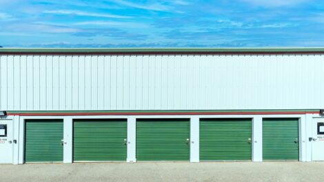 Devon - Exterior Units, green storage door, drive up access Devon Self Storage - Lemay Ferry