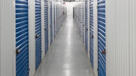 Hallway to storage units, blue door, Self Storage Units in Houston, TX, on Hwy 6 N