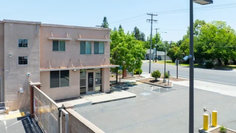 Exterior view of gated, secure self storage facility at Devon Self Storage - Marconi in Sacramento, California