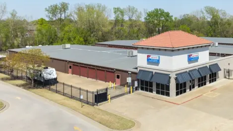 Exterior, drone view of self storage units. Front entrance and gated units in Bixby, OK at Devon Self Storage Bixby