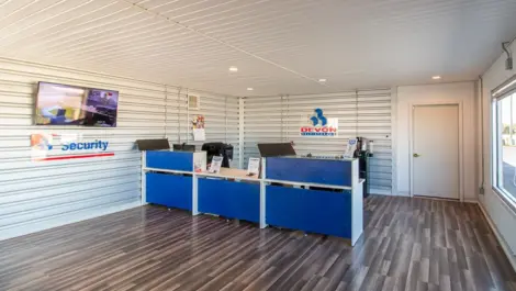 Office area with slick wood floors at storage facility in Ardmore, OK, at Devon Self Storage - Ardmore