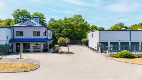 Exterior image of Devon Self Storage access gate Village Commons