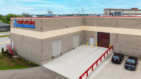 Outdoor loading dock for an indoor storage facility
