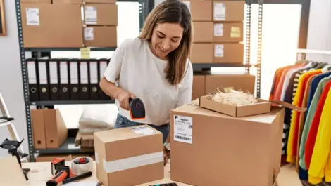 Young woman working on her business inventory.