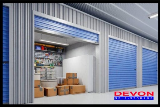 Insurance for storage. View of storage unit packed with storage items. Devon Self Storage