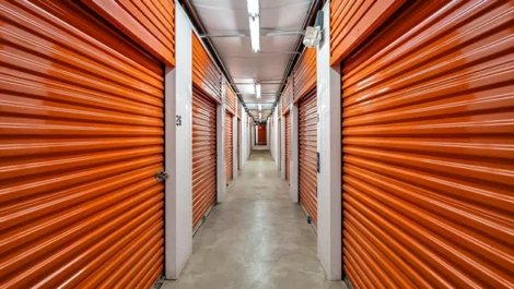 Devon Self Storage - Cobb Pkwy, hallway of storage units, orange doors