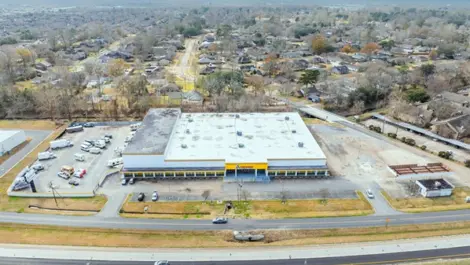Overhead view of indoor storage facility with outdoor parking storage