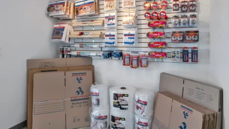 Devon Self Storage - Cobb , wall of storage supplies