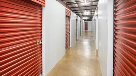 Hallway of red door, storage units Devon Self Storage - 2207 Pinhook RD