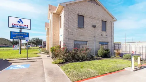Devon Self Storage in Katy, TX parking area and entrance