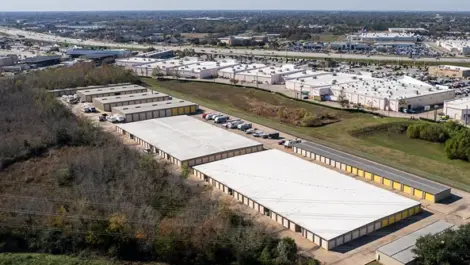 Sky view of outdoor storage units and RV parking storage in Pasadena, Texas, at Devon Self Storage Fairway Plaza