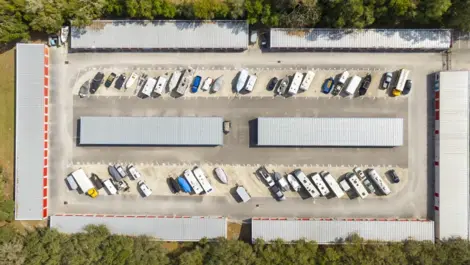 Aerial view of parking storage options for RV, boats, vehicles, cars, trucks, trailers at Devon Self Storage Emma Oaks