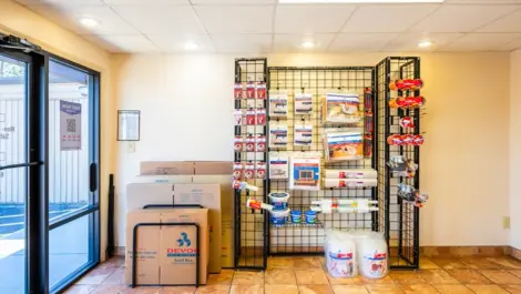 Wall of storage supplies Devon Self Storage - Two Notch Road