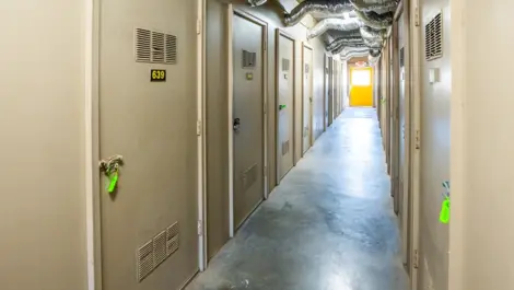 Hallway of doors to self storage Devon Self Storage - 2310 Pinhook RD