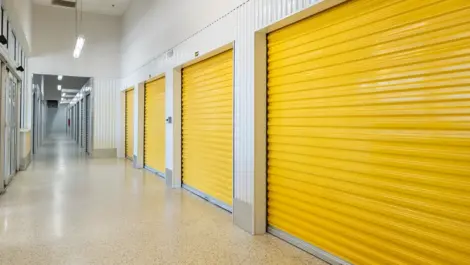 Another interior view of storage units with yellow door Devon Self Storage - Lawrenceville in Lawrenceville, GA