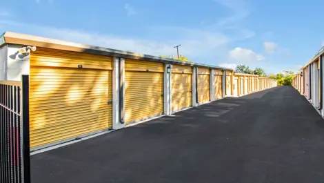 Yellow doors to storage units at Devon Self Storage - Vance Jackson in San Antonio, TX