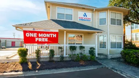 Exterior view of storage entrance building Devon Self Storage - Ingram Road in San Antonio, TX